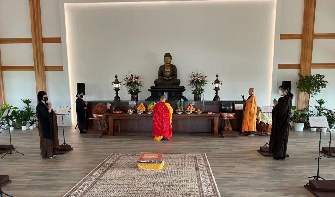 Buddhist temple interior with monks
