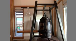Indoor setup featuring a ceremonial bell