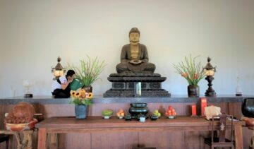Meditation space with Buddha statue centerpiece